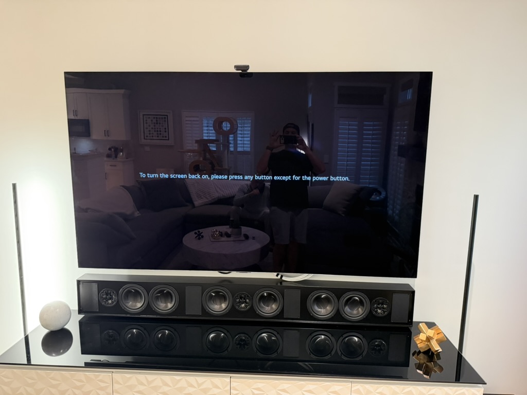 Finished living-room television wall with the custom James Loudspeaker LCR