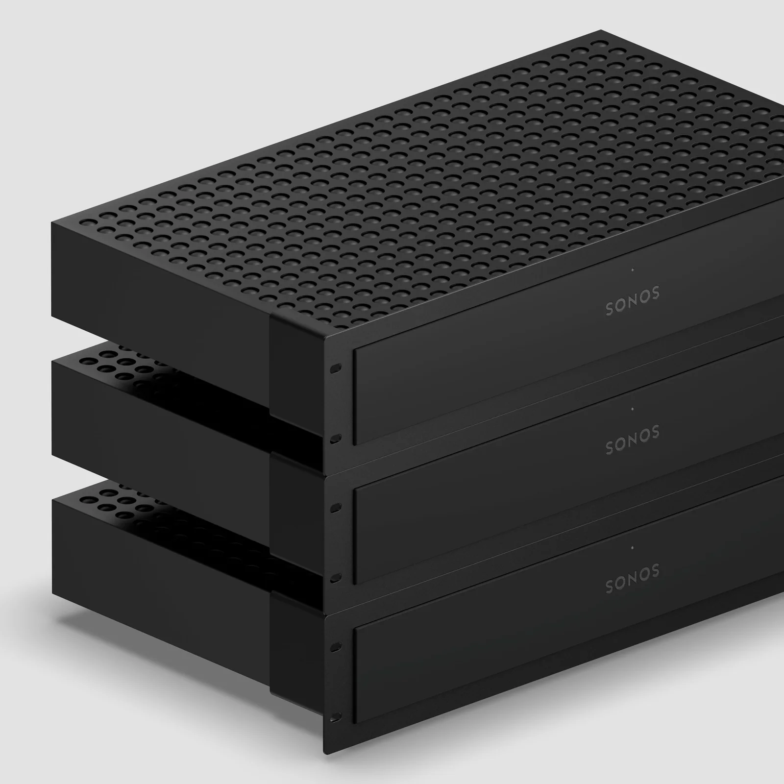 Three black Sonos Amp Multi units stacked together